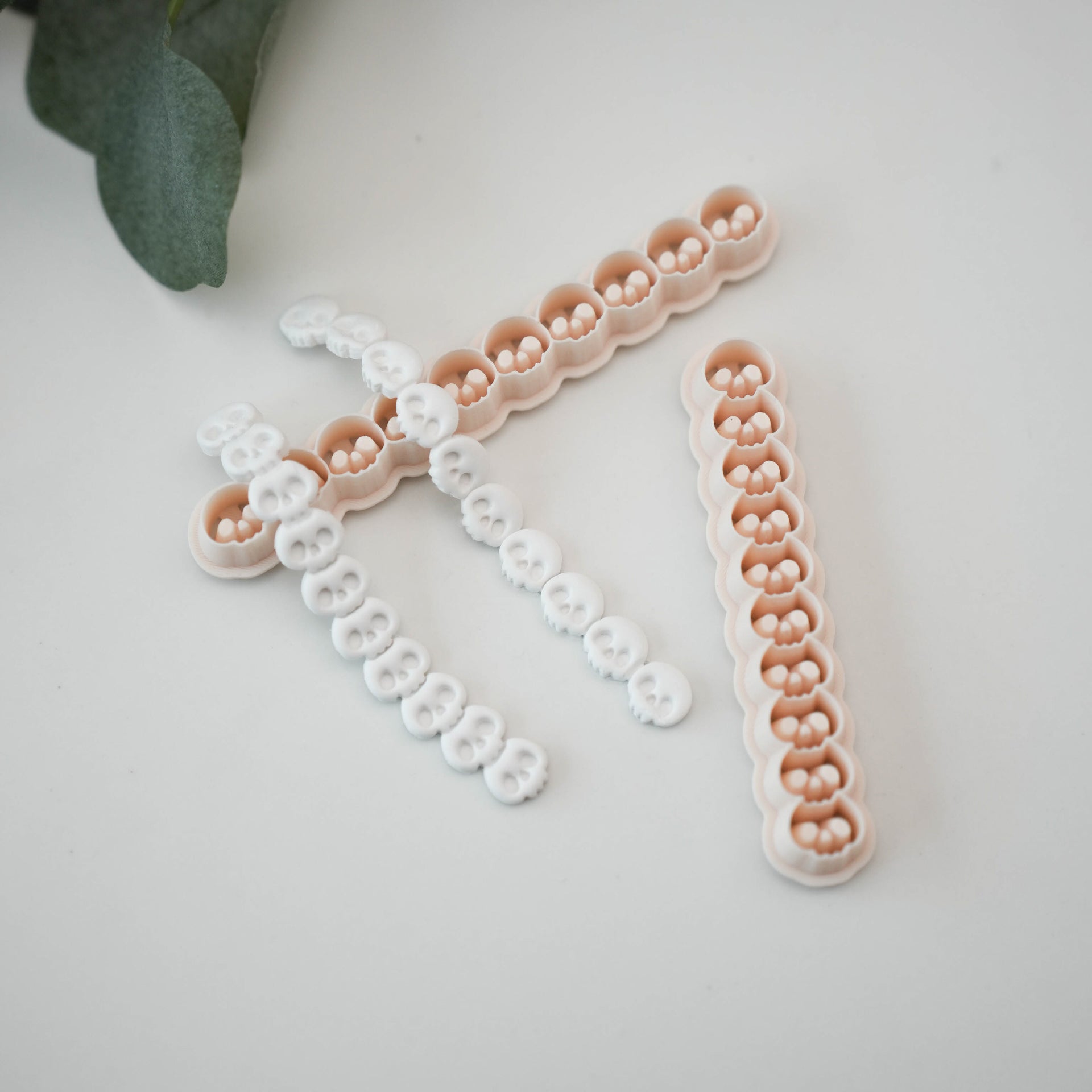 Two skull border strip cutter styles for Halloween clay projects