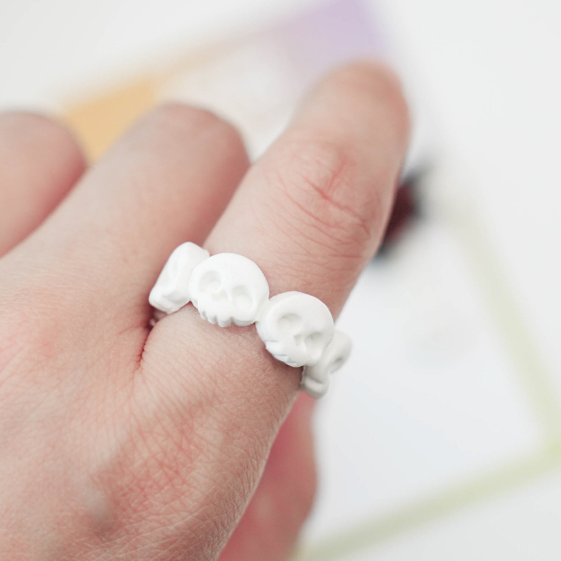 Finished skull polymer clay ring made with continuous skull cutter