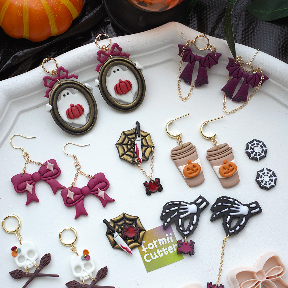Halloween polymer clay cutter collection with ghost, bows, spider webs and skeleton designs