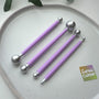 Four purple-handled double-ended ball stylus tools
