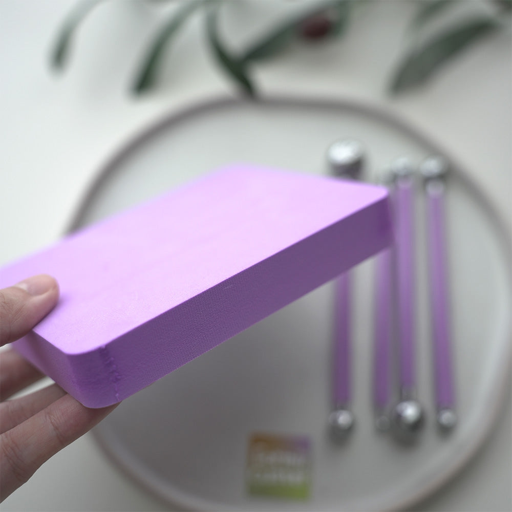 Purple flower shaping pad with demonstration props