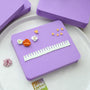 Purple flower shaping pad with demonstration props