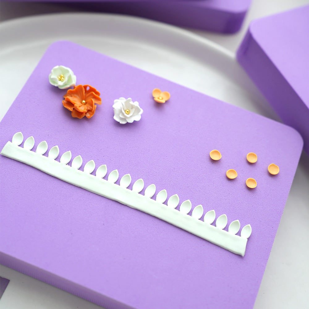Purple flower shaping pad with demonstration props