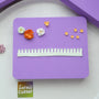 Purple flower shaping pad with demonstration props