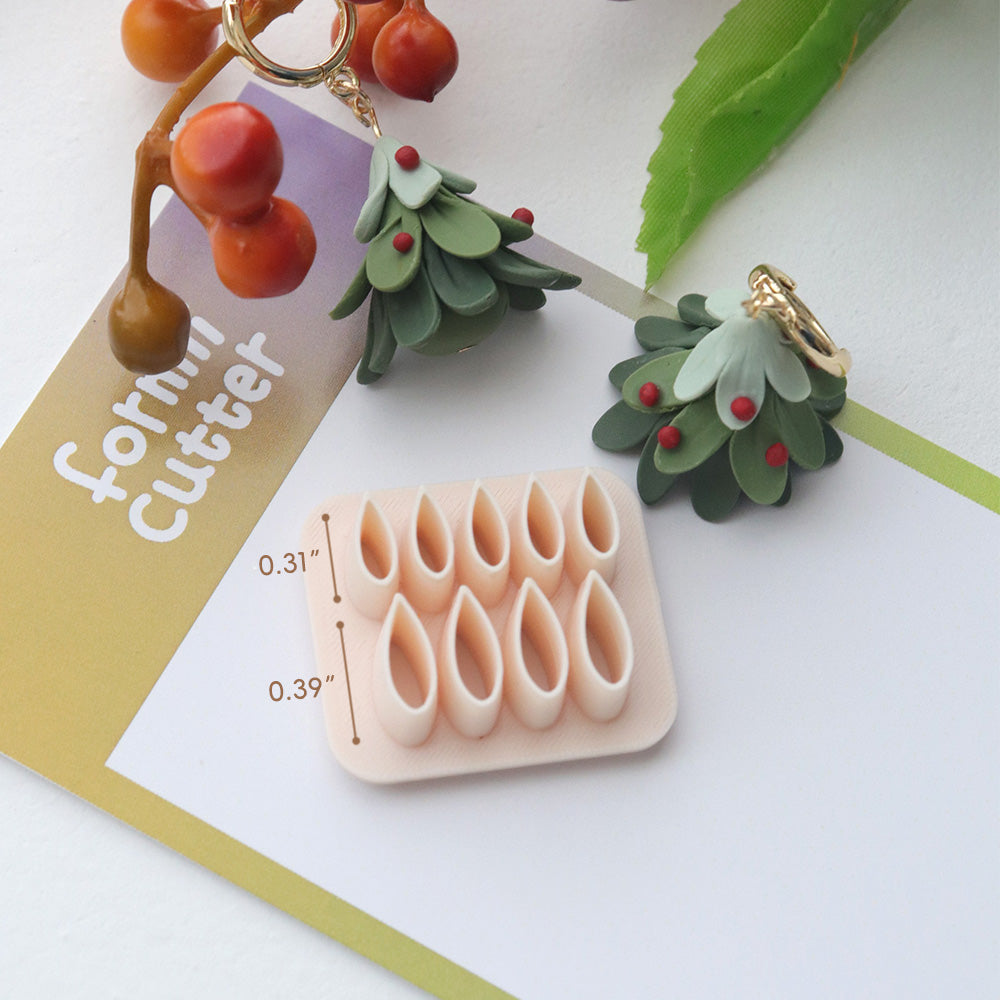 Nine-cavity leaf cutter size chart: five 0.31 inch shapes and four 0.39 inch shapes