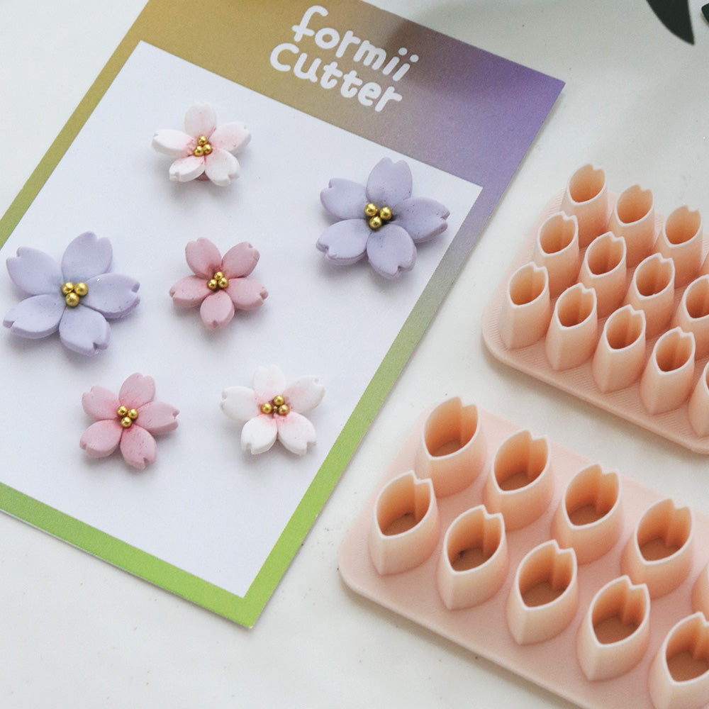 Sakura petal cutter plates with dimensional clay blossom examples
